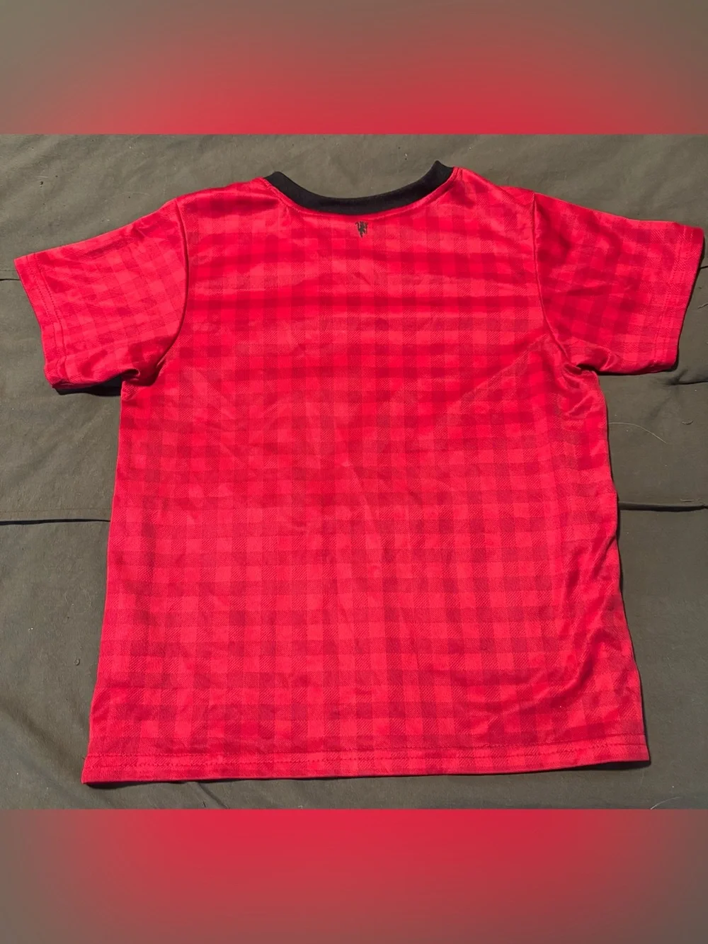 Nike Kids Red Manchester United Jersey with Black Trim